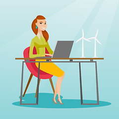 Image showing Woman working with model of wind turbines.