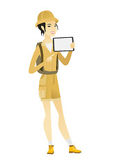 Image showing Smiling traveler holding tablet computer.