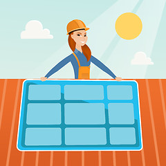 Image showing Constructor installing solar panel.