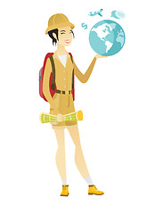 Image showing Asian traveler woman holding map and globe.