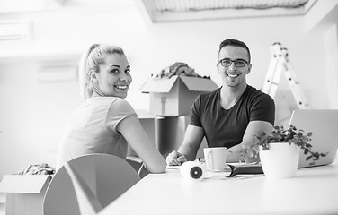 Image showing Young couple moving in a new home