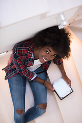 Image showing black woman using her electronic tablet