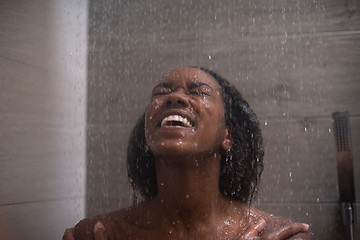 Image showing African American woman in the shower