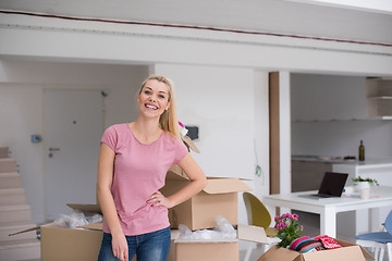 Image showing girl moving in the new apartment