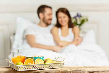 Image showing Relaxed Couple in Bed in bedroom at home