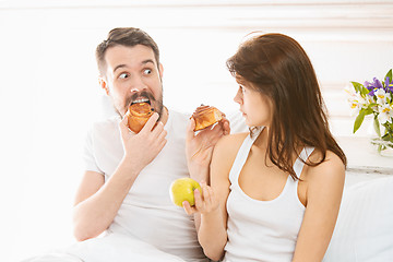 Image showing Relaxed Couple in Bed in bedroom at home