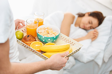 Image showing Relaxed Couple in Bed in bedroom at home