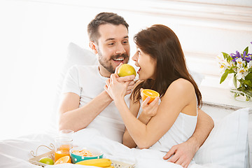 Image showing Relaxed Couple in Bed in bedroom at home