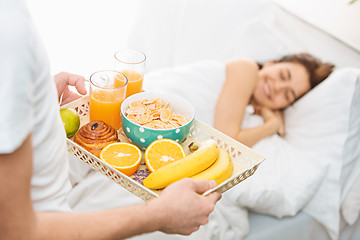 Image showing Relaxed Couple in Bed in bedroom at home