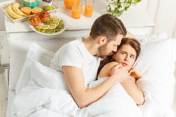 Image showing Relaxed Couple in Bed in bedroom at home