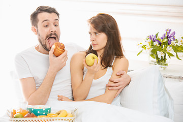 Image showing Relaxed Couple in Bed in bedroom at home