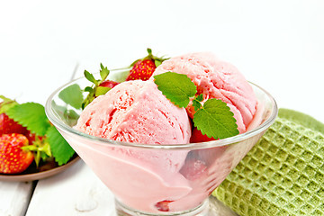 Image showing Ice cream strawberry in glass on light board