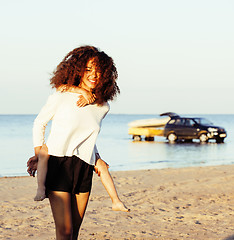 Image showing pretty diverse nation and age friends on sea coast having fun, lifestyle people concept on beach vacations close up