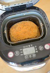 Image showing Bread machine and fresh bread at home