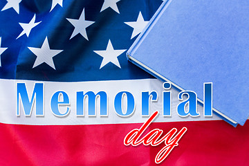 Image showing memorial day words over american flag and book