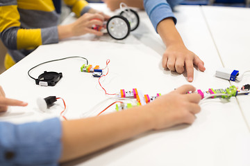 Image showing children with building kit at robotics school