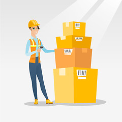 Image showing Warehouse worker scanning barcode on box.