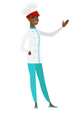 Image showing African-american chef cook showing a direction.