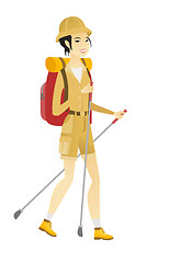 Image showing Asian woman hiker walking with trekking sticks.