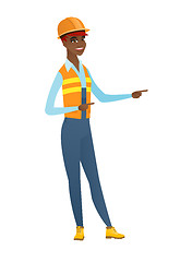 Image showing African-american builder pointing to the side.