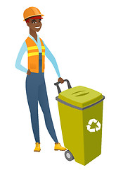 Image showing African-american builder pushing recycle bin.