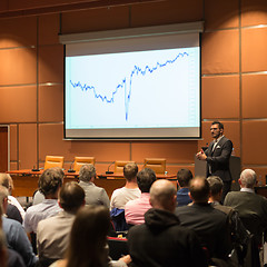 Image showing Business speaker giving a talk in conference hall.