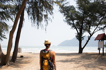 Image showing Girl in hat stands back