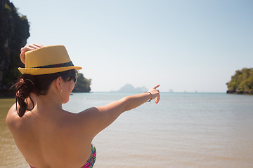 Image showing Woman in hat on sea