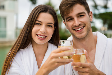 Image showing Young couple tasting wine