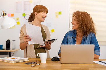 Image showing Two businesswoman working together