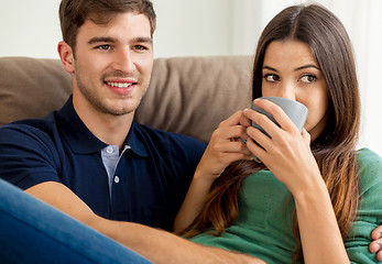 Image showing Young couple drinking coffee