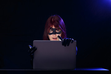 Image showing Night photo of female hacker