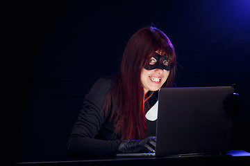 Image showing Girl spy in black mask