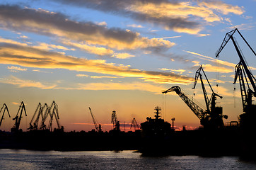 Image showing Harbor against red sunset background 