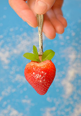 Image showing A heart shaped strawberry in spoon