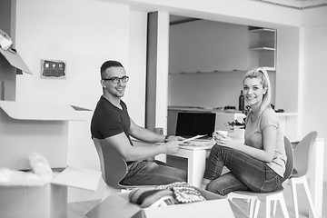 Image showing Young couple moving in a new home