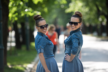 Image showing twin sister with sunglasses