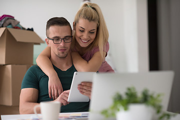 Image showing Young couple moving in a new home