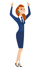Image showing Stewardess standing with raised arms up.