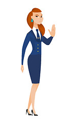 Image showing Caucasian stewardess showing stop hand gesture.