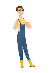 Image showing Caucasian confused farmer shrugging shoulders