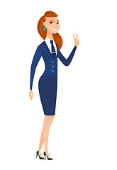 Image showing Caucasian stewardess showing the victory gesture.