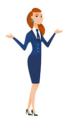 Image showing Caucasian confused stewardess with spread arms.