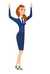 Image showing Stewardess standing with raised arms up.