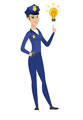 Image showing Policewoman pointing at idea light bulb.