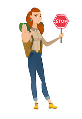 Image showing Caucasian traveler holding stop road sign.