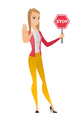 Image showing Caucasian business woman holding stop road sign.