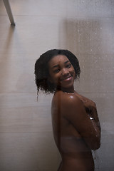 Image showing African American woman in the shower