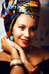 Image showing beauty bright african woman with creative make up, shawl on head