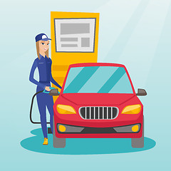 Image showing Worker filling up fuel into car.